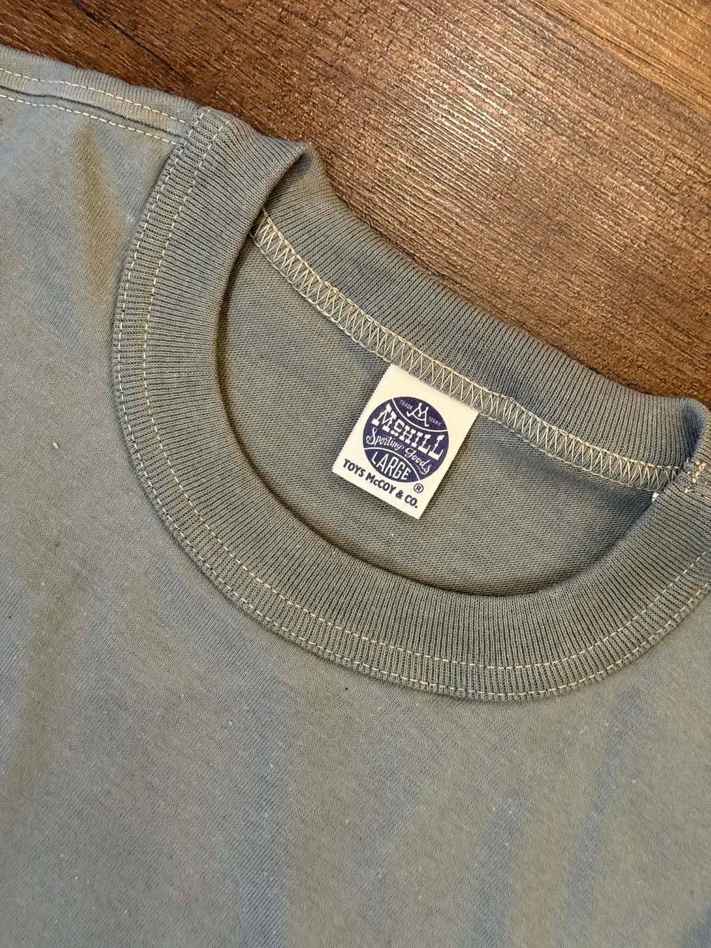 Toys McCoy "The Great American Hero" Pocket Tee - Green