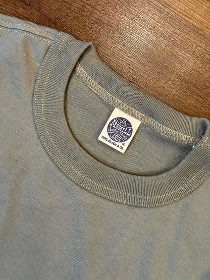 Toys McCoy "The Great American Hero" Pocket Tee - Green