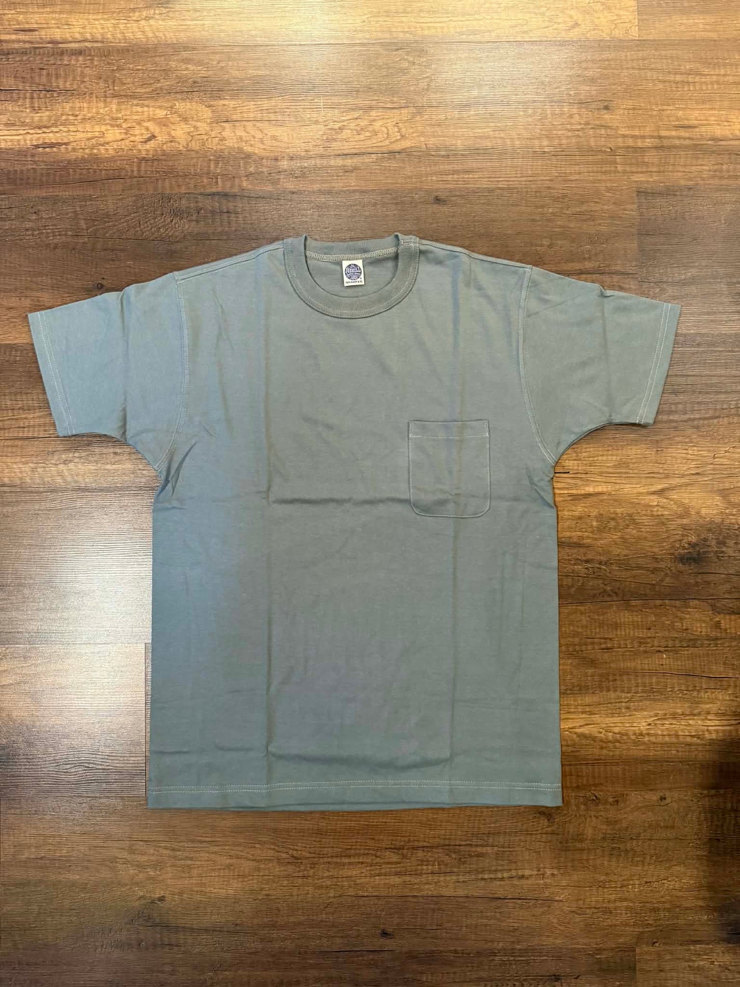 Toys McCoy "The Great American Hero" Pocket Tee - Green