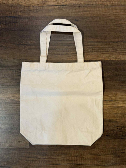 Toys McCoy 'Johnson Motors Inc' Canvas Tote Bag